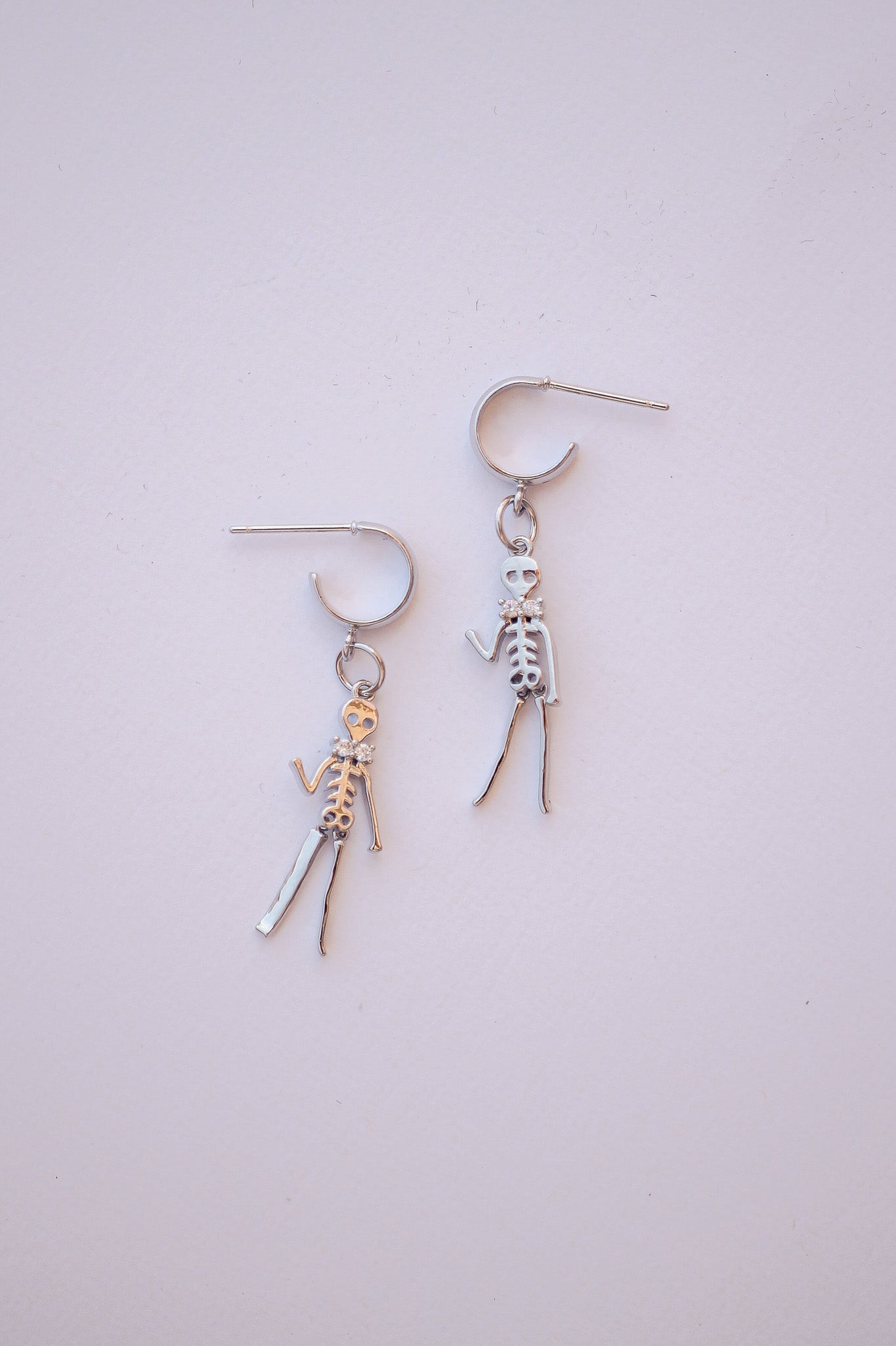 Dancing Skeleton Earring in Silver